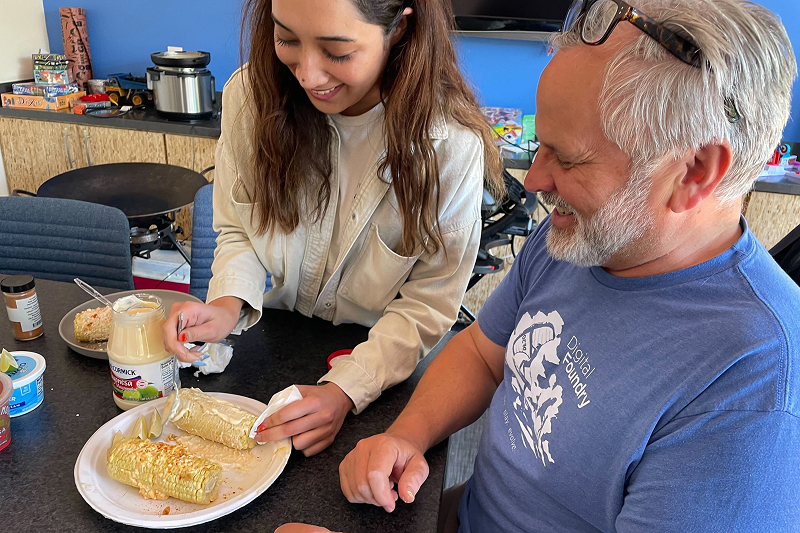 A digital Foundry software consultant and Digital Foundry's president put toppings on their elote during lunch